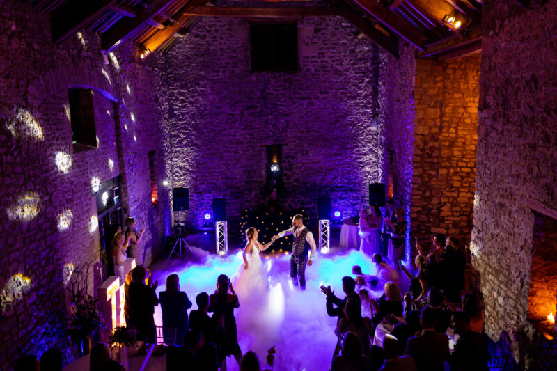 bride and groom doing the first dance at tythe barn at priston mill